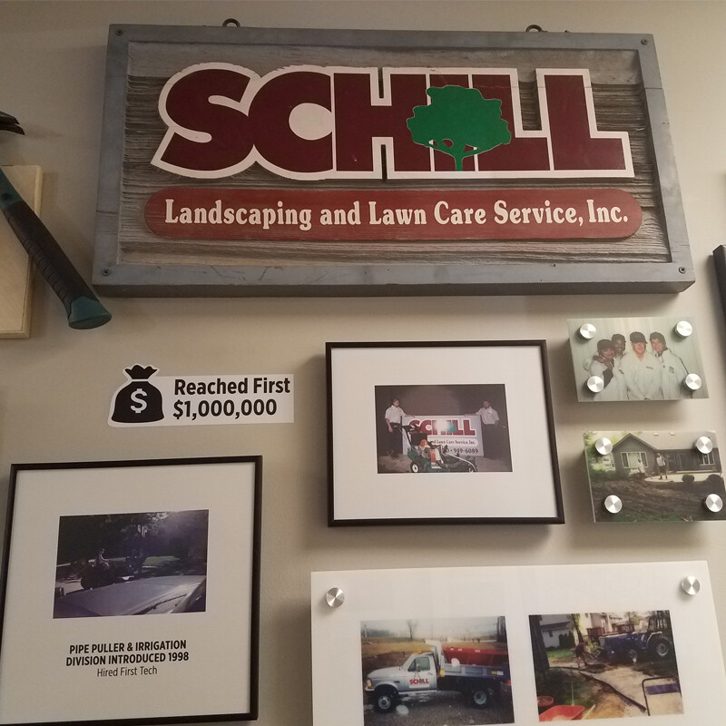 Mixed media history wall for Schill Grounds Management 25 year anniversary